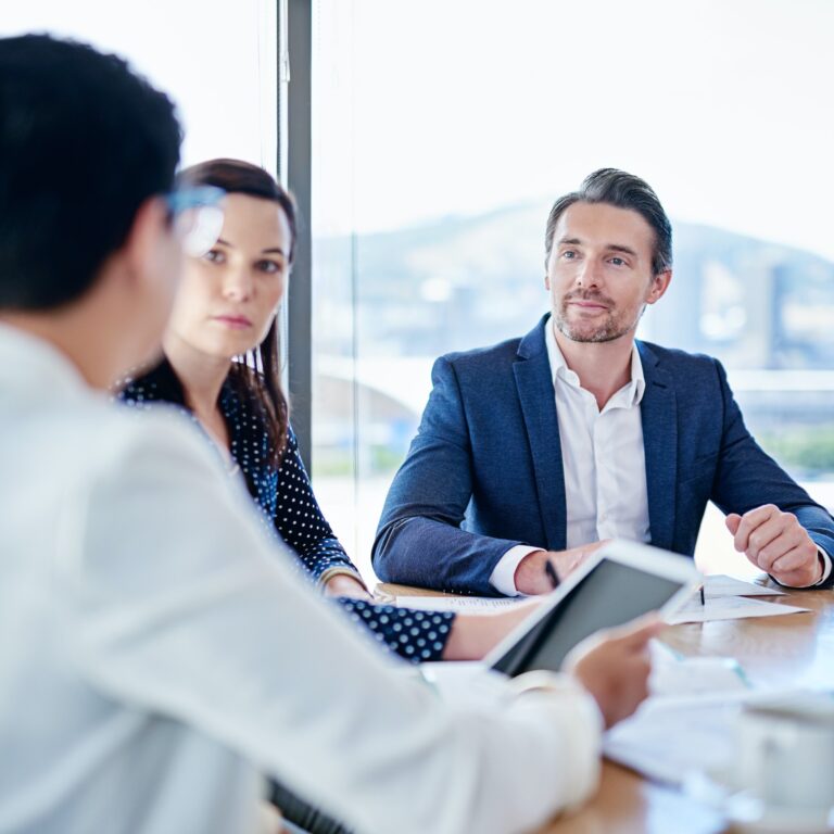 Cropped shot of corporate businesspeople meeting in the boardroom